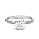 The classic, streamlined design of this 18k white gold wedding set is accented by .30 ctw of sparkling white round brilliant diamonds.