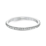 The classic, streamlined design of this 18k white gold wedding set is accented by .30 ctw of sparkling white round brilliant diamonds.