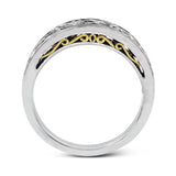 Featuring a delicate, intricate vintage style, this white gold wedding band is set with .09 ctw of shimmering white diamonds.