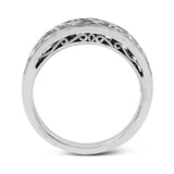 Featuring a delicate, intricate vintage style, this white gold wedding band is set with .09 ctw of shimmering white diamonds.