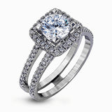 Featuring an eye-catching modern design, this white gold ring is accentuated with a dazzling .50 ctw round cut white diamonds.