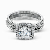 Featuring an eye-catching modern design, this white gold ring is accentuated with a dazzling .50 ctw round cut white diamonds.