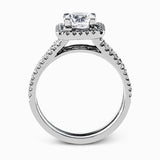 Featuring an eye-catching modern design, this white gold ring is accentuated with a dazzling .50 ctw round cut white diamonds.