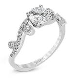 Playful and modern, this white gold wedding set sparkles with .31 ctw of round white diamonds highlighting the center stone.