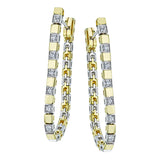 These versatile earrings can be worn in two ways, transforming from a line of diamonds into soft hoops. They're perfect for going from day to night.