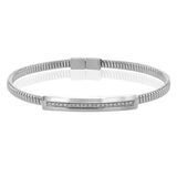 A perfect stacking bangle made of 18K white gold cable, adorned with a diamond plaque 0.23 ctw. and magnetic closure
