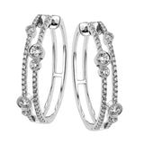 These whimsical 1.0 ctw diamond hoops have 2 rows of diamonds and are accented with larger bezel set diamonds for a modern twist