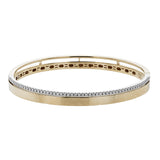 This stunning rose gold bangle has a matte finish and is accented by a row of white diamonds 0.32 ctw., along its edge.