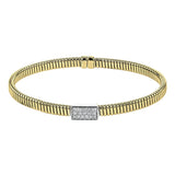 18k Yellow gold textured bangle is highlighted by .25 ctw of diamonds set in a rectangular design. Perfect for stacking