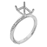 Unique twist design engagement ring with 0.19 ctw white diamonds set in a brushed white gold finish.