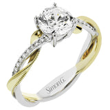18K two-tone engagement ring has a delicate twist design with a polished yellow gold side trimmed with milgrain beading, and a diamond side 1/10 ctw. set in white gold