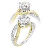 18K two-tone engagement ring has a delicate swirl design with a polished yellow gold side, and a white gold side set with 0.14 ctw of diamonds