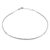 This 18k white gold choker features .79ct total diamond weight and can be worn alone for a signature statement or layered with other pieces to create a more dramatic look.