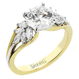 18 kt. floral inspired engagement ring has a yellow gold split shank and marquise side diamonds of .41 ctw set in white gold, along side the center stone creating the look of glimmering leaves