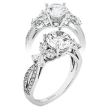 A beautiful engagement ring perfect for those who love floral inspired designs. It features a split shank setting with diamond accents .20ctw., & 8 pear shaped diamonds .62ctw. that create the look of petals around the center stone.