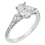 This modern 3 stone engagement ring is made for an oval center and flanked by 2 kite set diamonds 0.23 ctw, with round prong set diamonds along the shank 0.22 ctw.