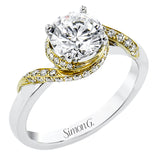 Contemporary 18 kt two-tone engagement ring has a swirl of white diamonds .24 ctw, set in yellow gold on a polished white gold shank