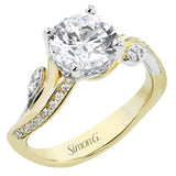 This unique two-tone engagement ring has a sculpted look and accent diamonds 0.21 ctw set to look like petals and dew drops, flanking the center stone