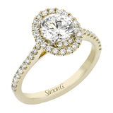 This diamond engagement ring has a sparkling line of prong set diamonds along the band, leading up to the center halo of round diamonds 0.39 ctw., and has 2 peek-a-boo yellow diamonds 0.02 ctw.