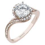 This modern vintage engagement ring of 18K rose gold features a swirl design band accented with white diamonds and a fine beaded trim, and diamond halo 0.22 ctw.