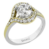 This modern two-tone engagement ring features a uniquely shaped halo with round diamonds of 0.39 ctw.