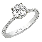 This new take on a classic engagement ring setting is part of our Underhalo Collection, where a circle of diamonds sits snugly around the side of the center stone, giving the perfect touch of sparkle from every angle.