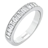 This gorgeous anniversary band is the perfect selection for those who seek a luxurious style to accompany any engagement ring, it features 1.06 cttw baguette diamonds with milgrain edges