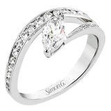 A marquise diamond set at an angle creates a contemporary look in this wonderful ring from our Lightning Collection.