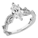A unique twisting design on the band makes this engagement ring stand out from the rest. This particular style is made to perfect hold a marquise shaped center stone.