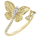 A golden butterfly alights on your hand, the remarkable beauty of nature captured forever in 18k gold and diamonds.