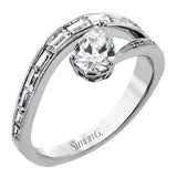 Like lightning zig-zagging across the sky, this dynamic 18k white gold ring contains a flowing line of .62 ctw baguette diamonds and one .55 ct pear shaped diamond set at an angle.
