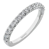 This wedding band is a classic choice with a straight design and .55 ctw of white diamonds.