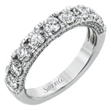 This straight band is anything but ordinary, containing an impressive 1.44 ctw of white diamonds.