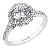 This lovely engagement ring provides an impressive amount of sparkle with .73 ctw in a halo design.