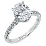 This 18k white gold engagement ring is perfect for an oval center stone, accented by .32 ctw of white diamonds.