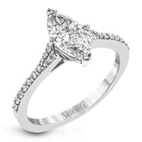 Simple yet stunning, this graceful engagement ring is made for a marquise cut center stone and is set with .16 ctw of white diamonds.