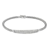 The perfect addition to any stack or worn alone, this 18K white gold bangle bracelet features 1.32cttw diamonds.