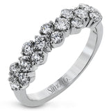 This ring features and expanse of .84 ctw of offset diamonds, creating a geometric look that can pair with any look.