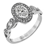 Reflecting a lovely romantic design, this white gold classic engagement ring features .16 ctw round cut white diamond accents.