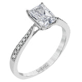 The delicate, understated design of this lovely white gold ring is elevated by .27 ctw of round white diamond accents.