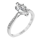 The delicate, understated design of this lovely white gold ring is elevated by .27 ctw of round white diamond accents.