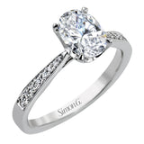 The delicate, understated design of this lovely white gold ring is elevated by .27 ctw of round white diamond accents.