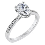 The delicate, understated design of this lovely white gold ring is elevated by .27 ctw of round white diamond accents.