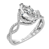 Classic with a modern twist, this white gold engagement ring features .50 ctw of sparkling white diamonds in a dramatic openwork design.