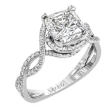 Classic with a modern twist, this white gold engagement ring features .50 ctw of sparkling white diamonds in a dramatic openwork design.
