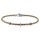 This easy-to-wear bracelet features three white gold stations set with .10ctw of diamonds set in a woven braid of 18k rose gold.