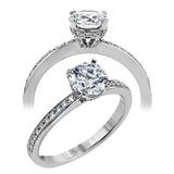 18K white gold engagement ring featuring .22cttw diamonds.  (center stone sold separately)