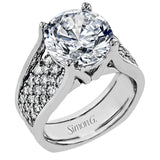 This engagement ring sure is a stunner with a wide band set with a full 1.20 ctw of white diamonds.