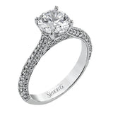 This stunning 18K engagement ring has pave set diamonds of 0.66 ctw., on all 3 sides for a sleek look