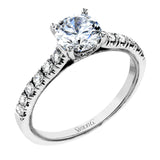 This classic 18k gold engagement ring setting contains .37 ctw of sparkling white diamonds.